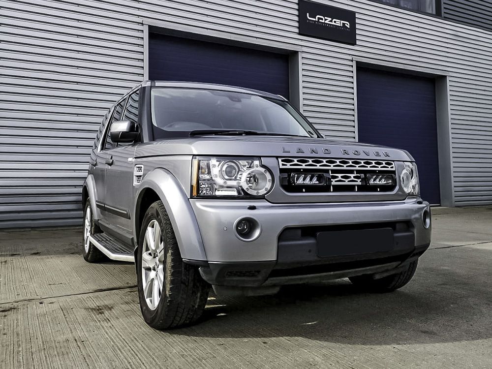 LAZER LAMPS Land Rover Discovery4 (2009-2013) - Grille Mount Kit (includes: 2x Triple-R 750 Std (Gen2), 1x Grille Mount Brackets, 1x 2L-LP-PL-120)
