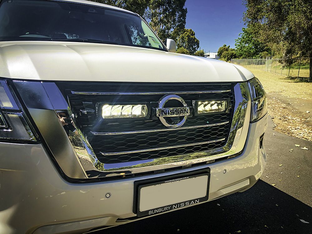 LAZER LAMPS Nissan Patrol Y62 - Series 5 (2020-2022) - Grille Mount Kit (Carbon composite) - Includes: 2x Triple-R 750 Beacon, 1x Grille Mount Brackets, 1x 2L-LP-6C-120